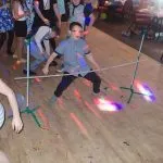 Kids doing limbo