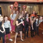 Kids party doing karaoke